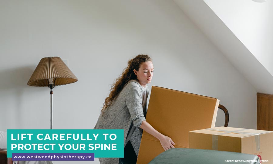 Lift carefully to protect your spine